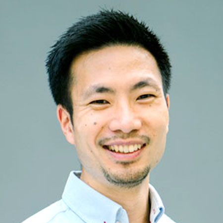 close up of smiling male with short hair